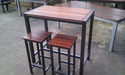 Custom furniture maker near me, bar height table with wood and steel