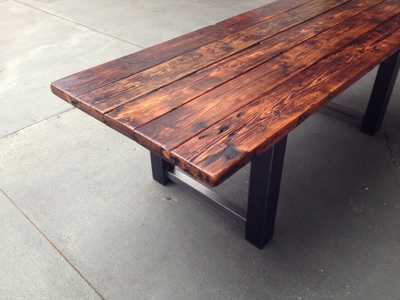 Wood dining table with steel legs